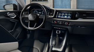 The interior is driver-focused with a revolutionary operating concept and firmly immersed in the digital world.